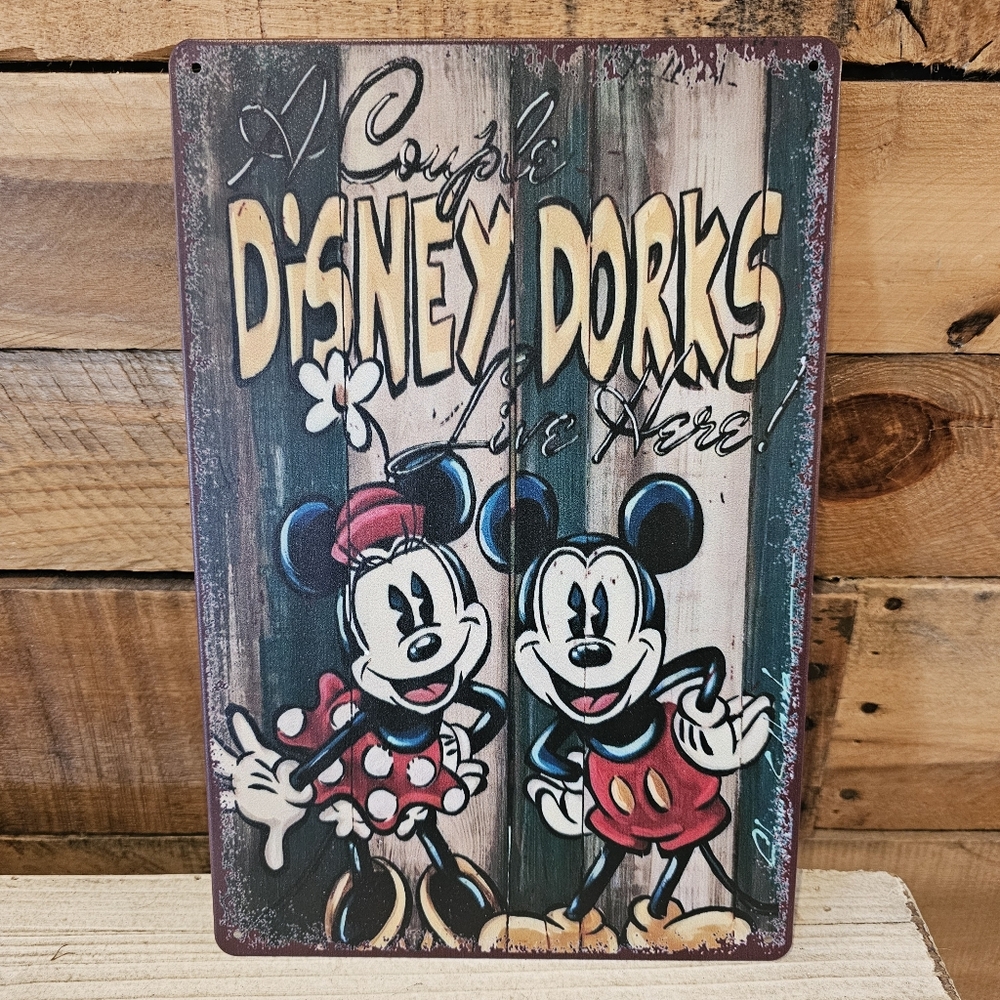 "A Couple Disney Dorks Live Here" tin sign 7-3/4" x 11-3/4"